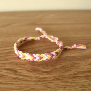 10/$25 Pink Yellow Woven Bracelet